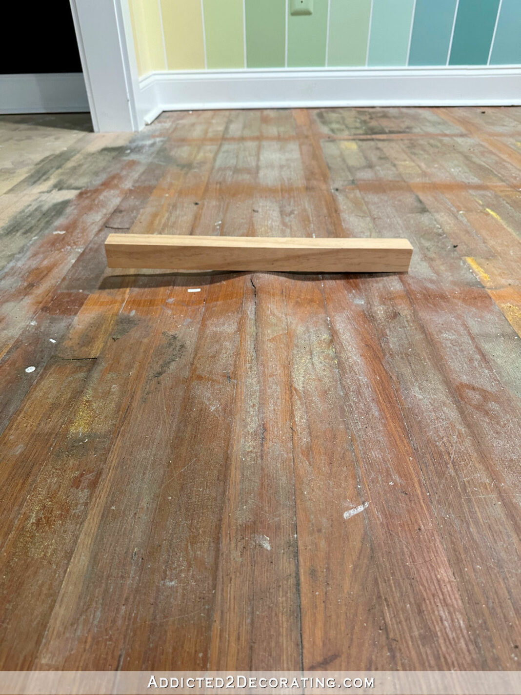 Damage done to hardwood floor and subfloor by FLOR carpet tiles